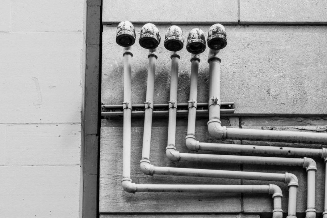 Technician fixing office ceiling